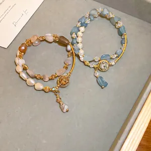 Bracciale a doppio strato in stile francese con perle d'acqua dolce e cristalli blu