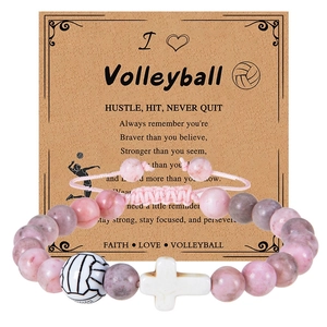 Detail of pink marble beads and volleyball charm bracelet on kraft message card