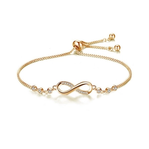 Detail of rose gold infinity bracelet with zircon accents and adjustable toggle clasp