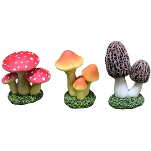 Three assorted miniature resin mushrooms with moss bases for DIY garden micro landscapes