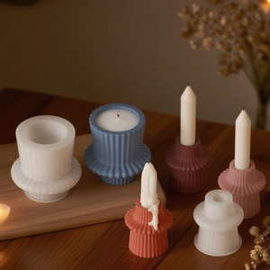 Macro detail of geometric striped candle mold with finished column wax results