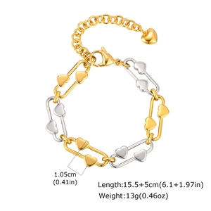 Detail shot of two-tone gold and silver heart chain bracelet with size measurements