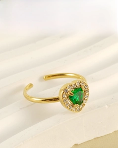 Detail of 18K gold-plated stainless steel ring featuring heart-shaped green zircon stone