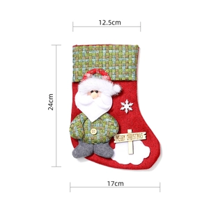 Mini burlap Christmas stocking showing 24cm height and 12.5cm width dimensions