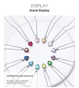 Detailed top view of twelve heart-shaped S925 silver necklaces with colorful zircon stones