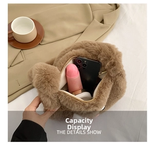 Detail showing internal storage capacity for phone and cosmetics in brown plush bag
