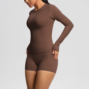 Close-up of coffee brown slim fit yoga set featuring high-elasticity matte fabric