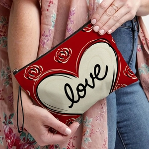 Red canvas heart makeup bag with floral love print and convenient wrist strap