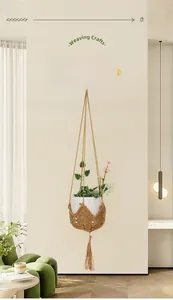 Close-up of a handmade macramé plant hanger with intricate knotted rope and long tassels