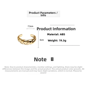 Minimalist twisted golden ABS bangle with textured surface showing 7.5cm x 6cm dimensions
