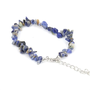 Macro detail of natural irregular blue crystal stones with silver adjustable lobster clasp