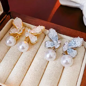 Elegant butterfly zircon drop earrings with pearls in gold and silver finish