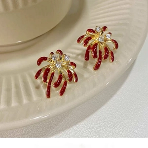 18k gold plated firework stud earrings with red enamel and shimmering cubic zirconia stones