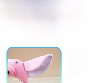 Detailed macro view of pink plush pig headband for kids made of soft felt fabric