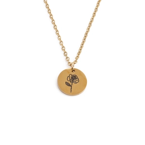 Detailed close-up of golden stainless steel necklace with rose flower engraved pendant