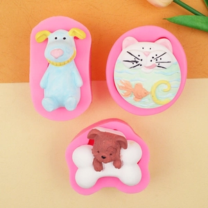 Three-piece pink silicone mold set for DIY soaps with dog, cat, and fish shapes