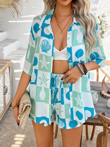 Detail of bohemian shirt and shorts set featuring blue seashell and starfish patterns