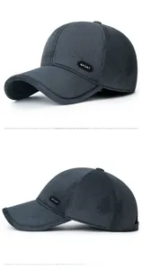 Detail view of winter sport baseball cap showing dark grey waffle texture and sport label