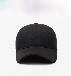 Close-up of winter baseball cap featuring textured wool fabric and metal SORT emblem