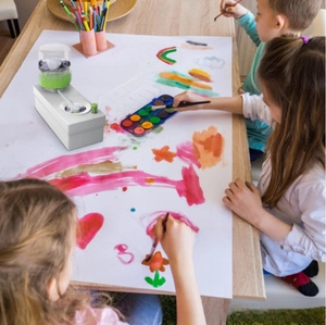 Cycle water paint brush cleaner with a water bottle and collection tray for kids art