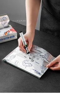Close-up of food storage bag with writable area for date and content recording