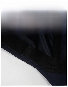 Detail of wide black sweatband inside quick-dry navy baseball cap for sweat absorption