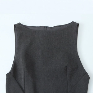Modern dark gray sleeveless dress featuring a structured round neck and minimalist tailoring
