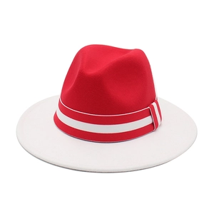 Two-tone wool felt fedora hat featuring red crown and wide white brim with striped ribbon
