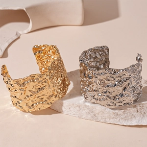 Abstract geometric metal cuff bracelet with crumpled texture in gold and silver finish