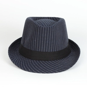 Detail of navy blue pinstripe cotton jazz hat featuring a black grosgrain ribbon band