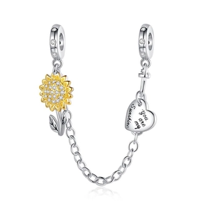 Detail of silver safety chain with sunflower and heart charm engraved with You are my Sunshine