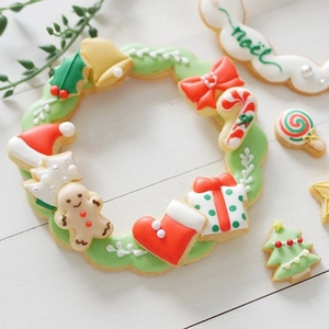 Mini Christmas cookie mold set with gingerbread man and festive wreath shapes