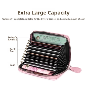 Pink leather accordion card holder with 11 slots and secure silver metal zipper