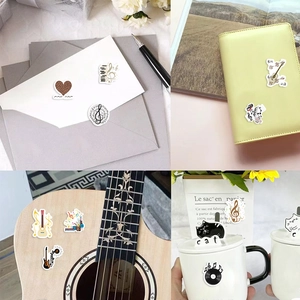 Detail shots of music stickers with notes and instruments for journaling and crafts