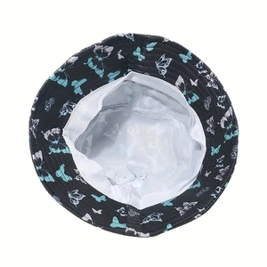 Unisex black bucket hat featuring butterfly prints and breathable white fabric lining