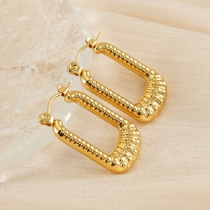 Polished 18K gold-plated stainless steel rectangular earrings with textured ribbing detail