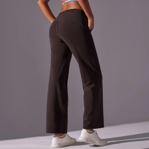 Pantalones de yoga de pana marrón oscuro con pernera ancha y textura de canalé vertical