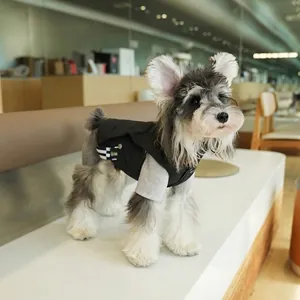 Gilet matelassé noir chaud pour chien avec bordure à damier et boucle métallique