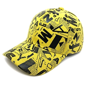 Yellow graffiti baseball cap with black typography print and curved brim in street style