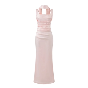 Detail of pink satin evening gown featuring elegant ruching and halter neck design