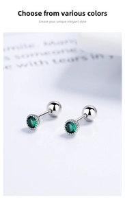 Detailed macro view of green zircon stud earrings with secure ball screw back closure