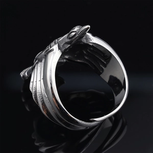 Vintage stainless steel sun bird totem ring with feather textures in retro gothic style