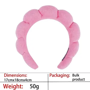 Pink plush spa headband detail showing soft fabric texture with 17x18x4cm dimensions