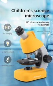 Close-up of portable yellow children's HD microscope for biology science experiments