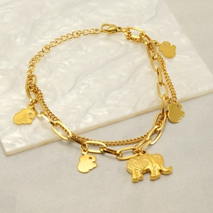 18k gold plated stainless steel bracelet with multiple elephant charms on marble background