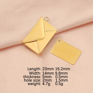 Macro view of gold stainless steel envelope locket and metal insert with size details