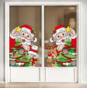 Christmas window decals with Santa, tree and reindeer on a white glass door