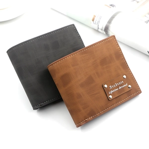 Detail view of MenBense short wallets showing premium textured leather in dark grey and brown