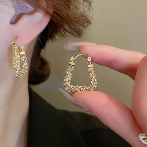 Elegant gold U-shaped geometric earrings with sparkling zircon pave for women