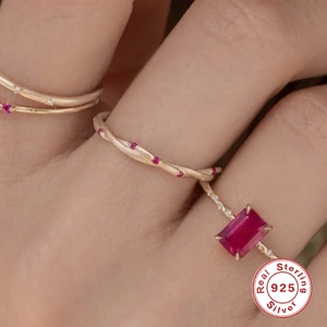 S925 sterling silver braided ring set with rectangle ruby and pink gemstones on hand